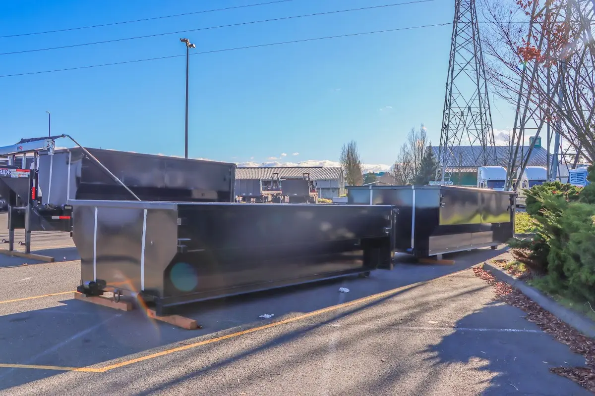 Roll-off dumpster ready for waste disposal at job site for Demolition Dumpster Rental in Greenville